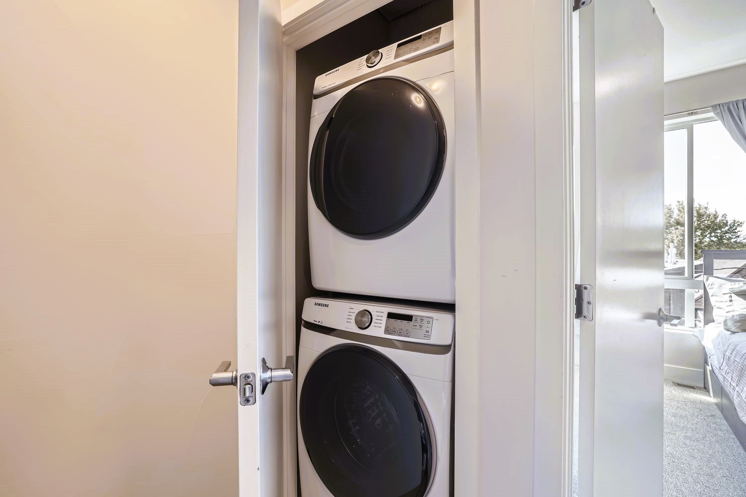 Keep your wardrobe fresh with your own private washer and dryer, tucked conveniently in a closet for easy access during your stay.