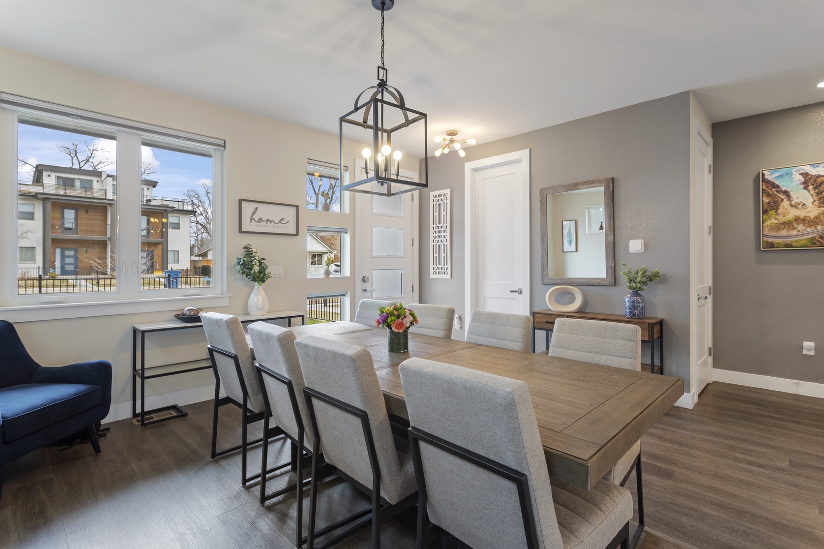 Gather around your elegant dining table for memorable meals, with warm lighting and modern decor creating the perfect atmosphere for your stay.