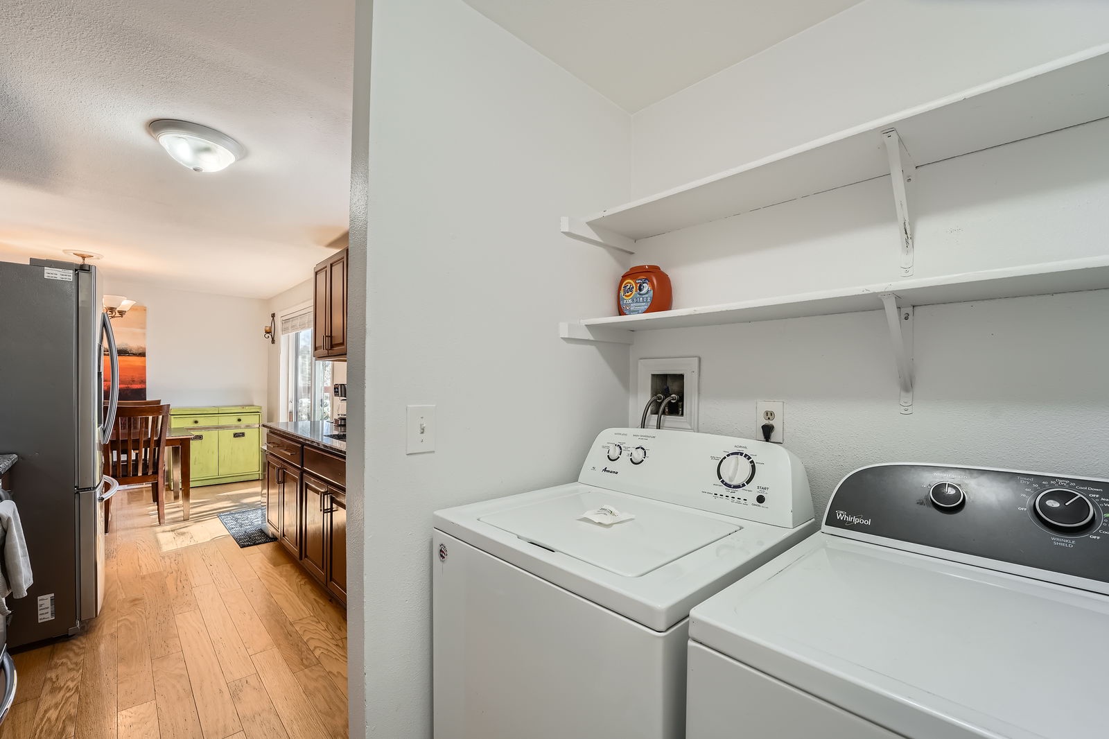 Your own dedicated laundry nook keeps you refreshed throughout your stay, with convenient shelving for supplies.
