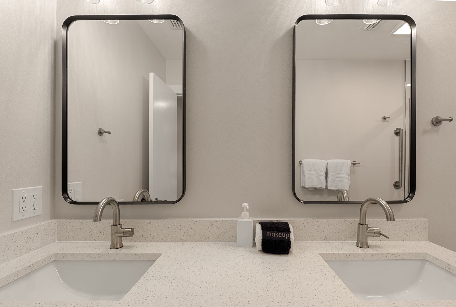 Your spacious double vanity bathroom features modern fixtures and ample counter space for your morning routine.