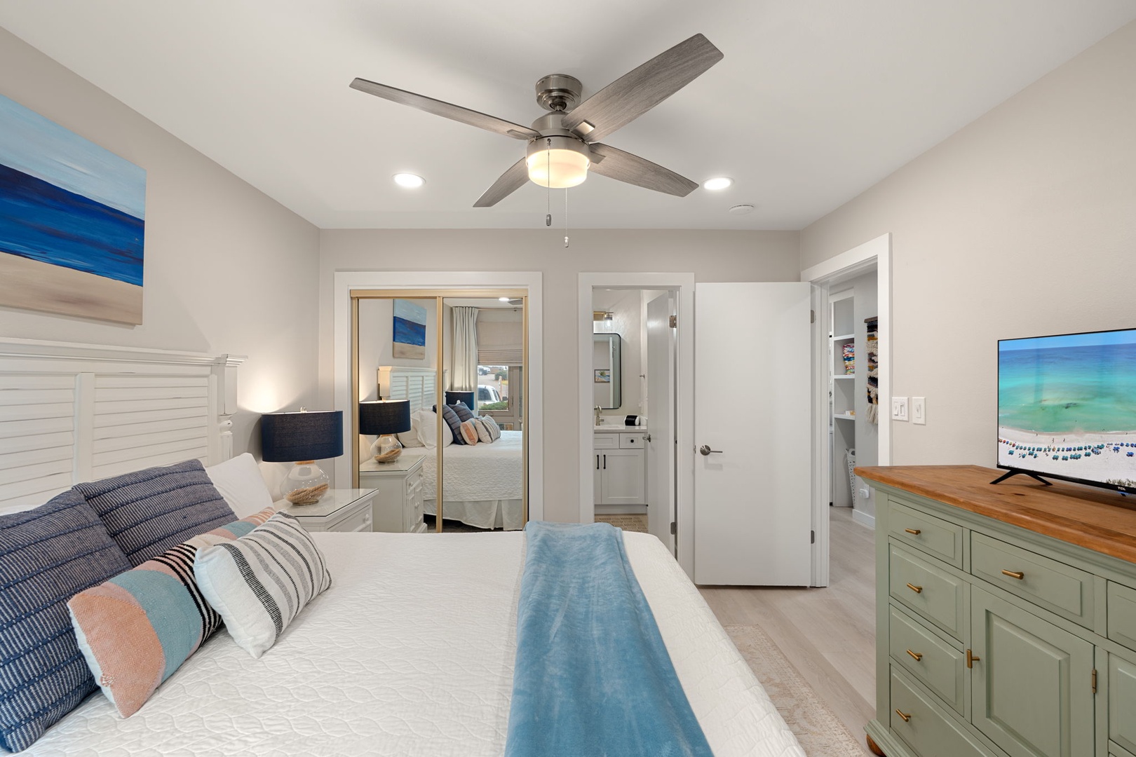 Coastal King Bedroom with Ensuite Bath & Bright Decor