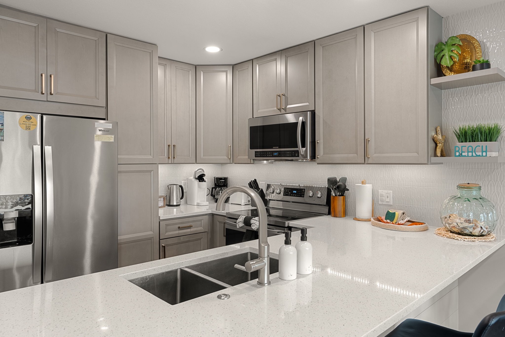 Your modern kitchen features granite countertops, stainless steel appliances, and everything you need to prepare delicious meals during your stay.