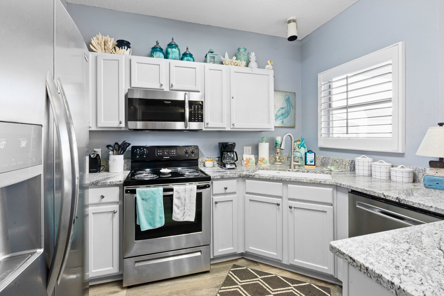 Your fully equipped kitchen features stainless steel appliances and granite countertops, perfect for preparing meals during your stay.