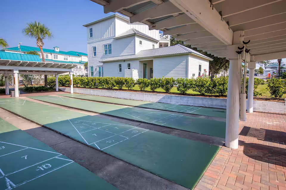 Enjoy friendly competition at the community shuffleboard courts just steps from the pool area. A fun outdoor amenity perfect for relaxing afternoons with family and friends along 30A. Another great way to experience the laid-back coastal lifestyle.
