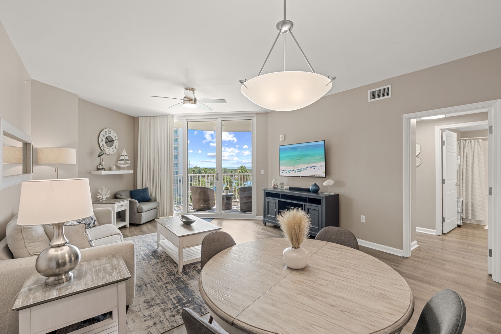 Step into your coastal retreat where soft neutral tones and abundant natural light create a serene atmosphere. Relax in the open living space with views of the waterfront through your private balcony.