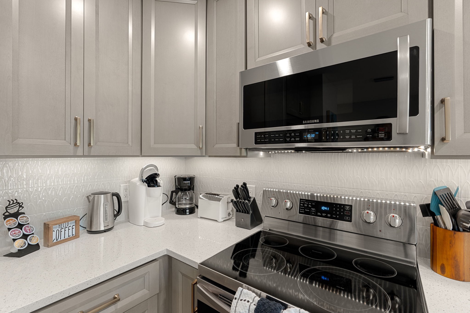 Your fully equipped kitchen features stainless steel appliances and modern conveniences for preparing meals during your stay.