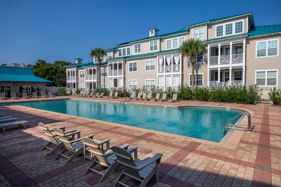 Relax beside the resort-style pool surrounded by coastal charm and sunny skies. Perfect for unwinding after a beach day or spending the afternoon soaking up the Florida sunshine. A peaceful retreat designed for laid-back vacation living.