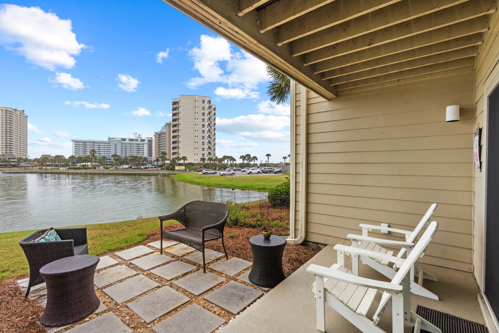 Relax on your private patio with serene lake views and comfortable seating perfect for morning coffee or evening sunset watching.