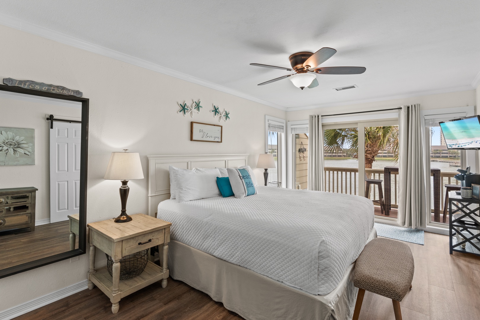 Wake up in your coastal bedroom with palm tree views from your private balcony.