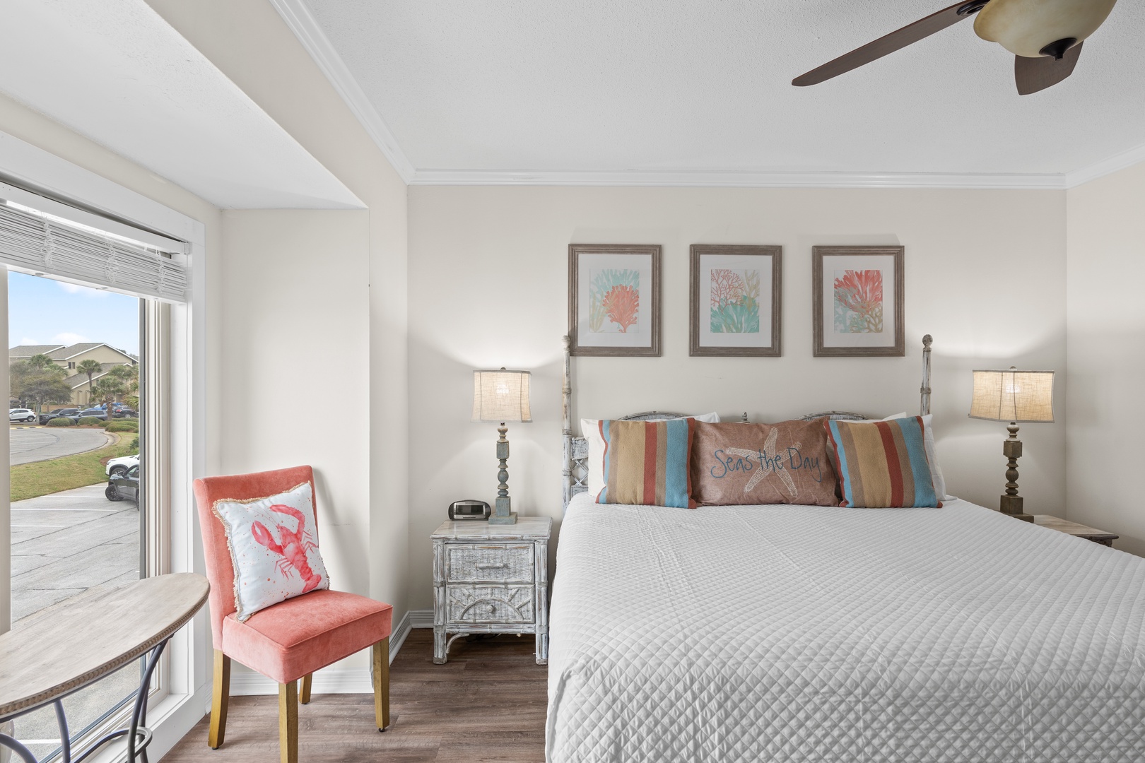 Drift off in your coastal-themed bedroom with ocean breezes from the ceiling fan and charming nautical artwork to inspire sweet dreams.