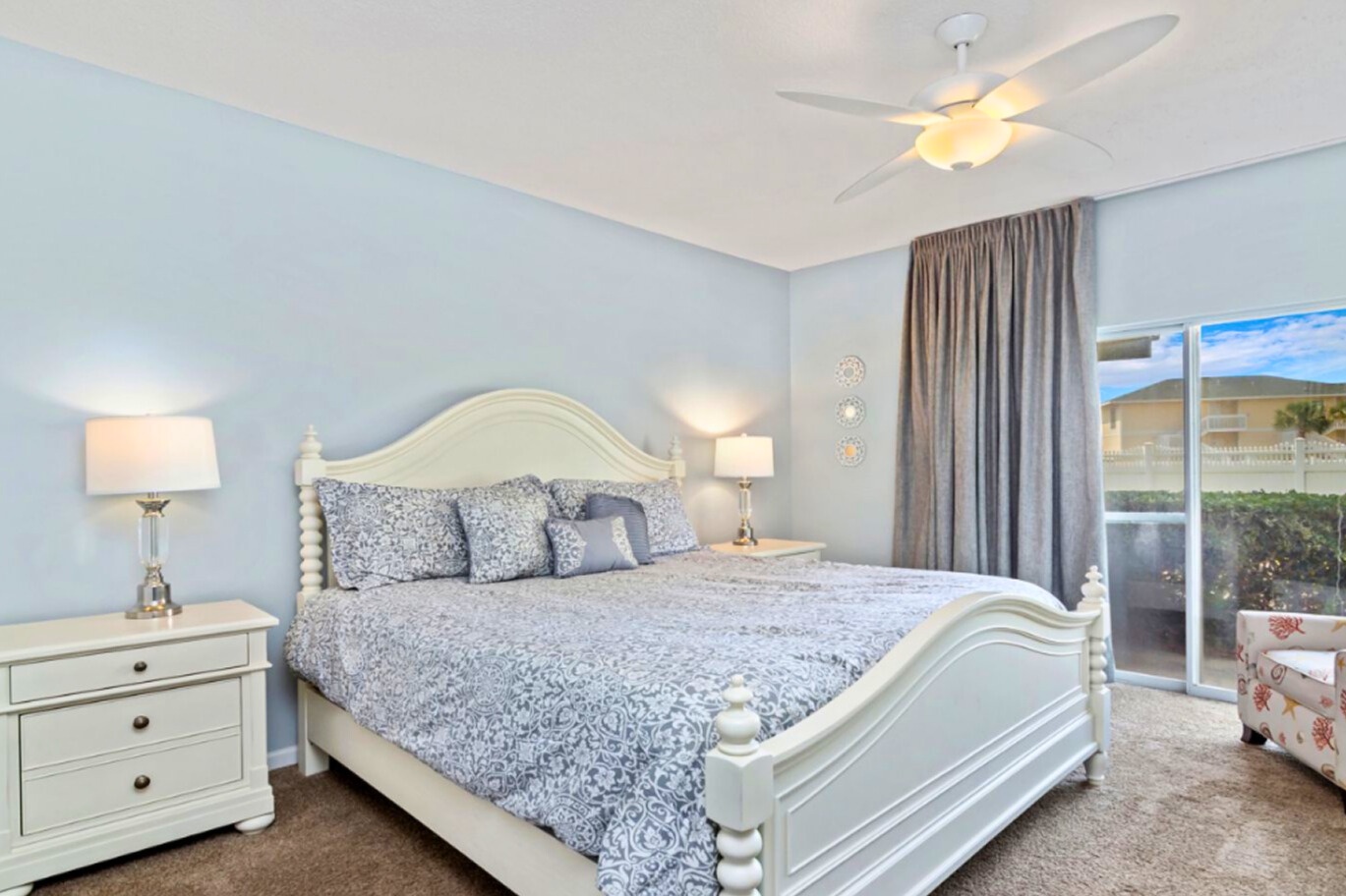 Drift off to sleep in your serene master bedroom, complete with elegant bedding and calming blue walls that create a peaceful retreat.