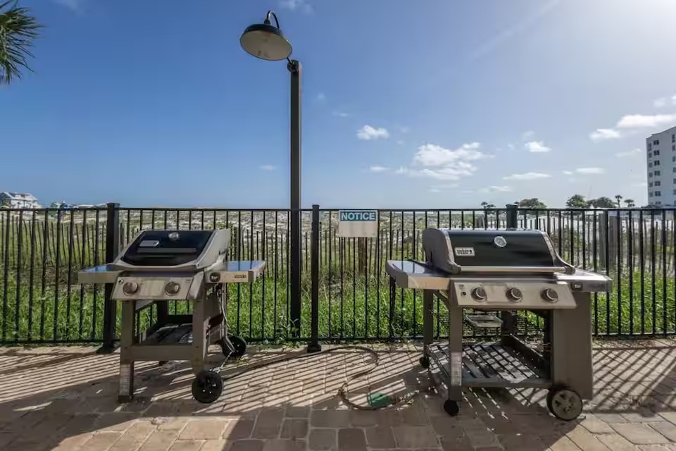 Beachfront grilling area with Gulf views—cook out just steps from the sand and enjoy outdoor dining by the water.
