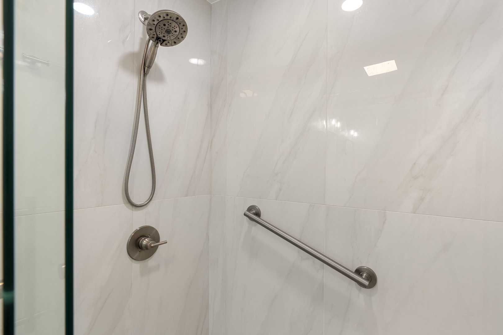 Modern Marble Walk-In Shower with Sleek Fixtures
