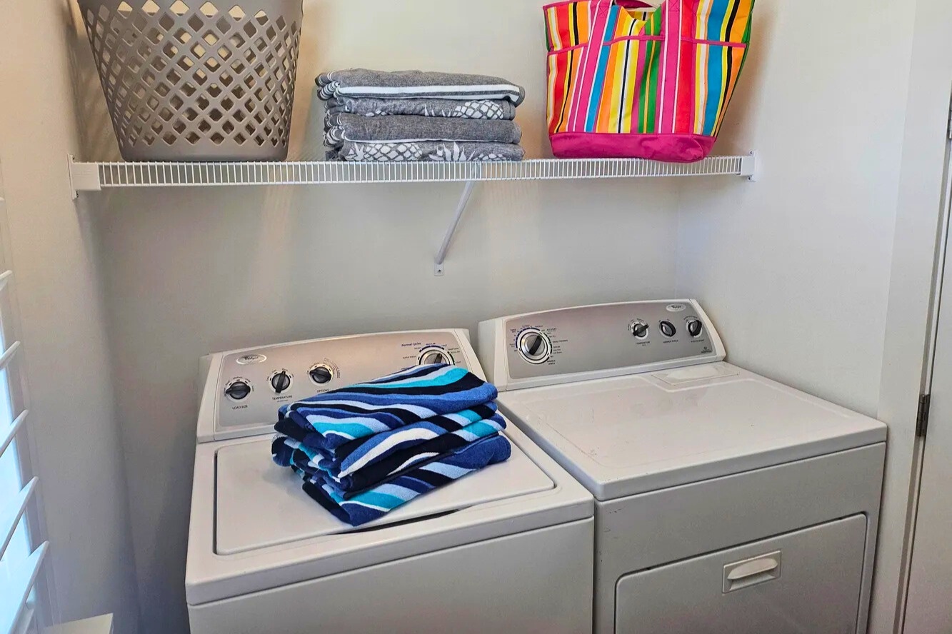 Convenient in-home laundry with full-size washer and dryer, perfect for refreshing beach towels and keeping your stay easy, comfortable, and carefree - beach towels not provided.