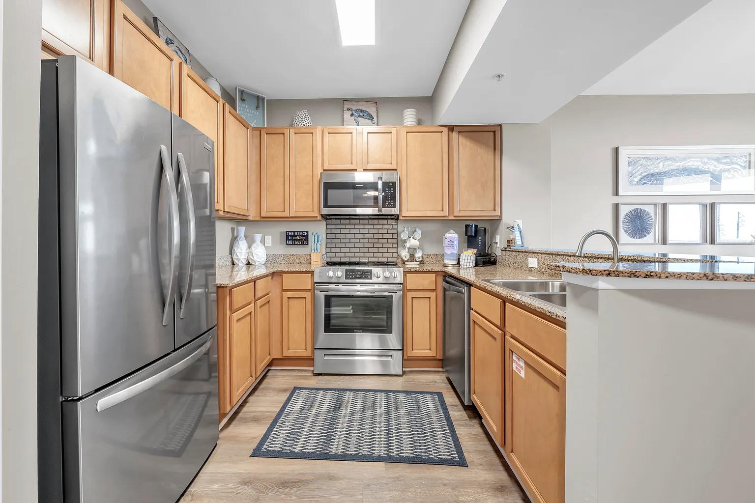 Your fully equipped kitchen features granite counters, stainless appliances, and everything you need to create memorable meals during your stay.