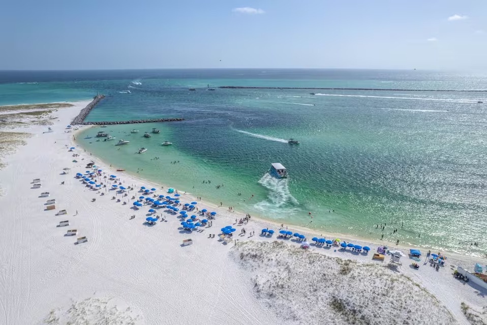 Crystal-clear Emerald waters and sugar-white sands—perfect for beach days, swimming, and soaking up the Destin sunshine.