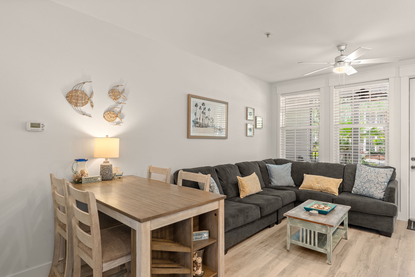 Sink into the cozy sectional after a day of exploring, with coastal décor that invites you to unwind and a dining area perfect for gathering around meals together.