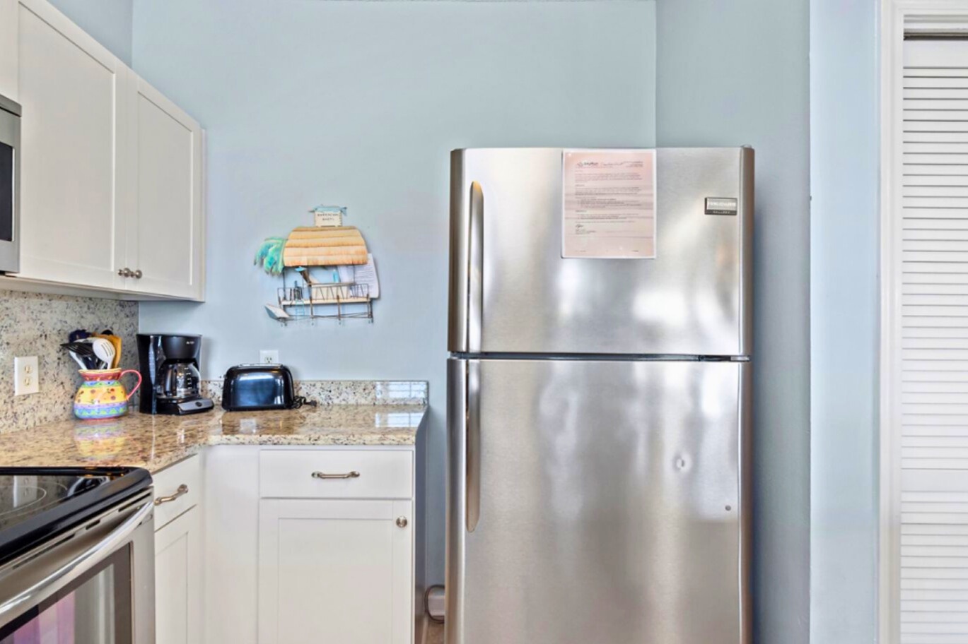 Your fully equipped kitchen features stainless steel appliances and granite countertops for easy meal preparation.