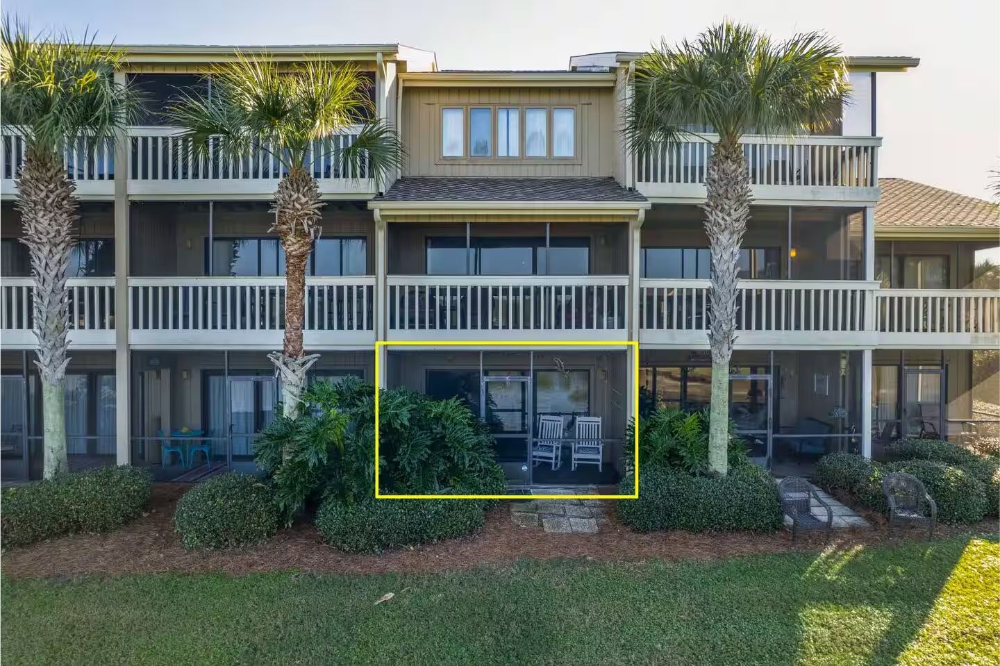 First floor unit with screened back porch that has a sweeping view of the lake.