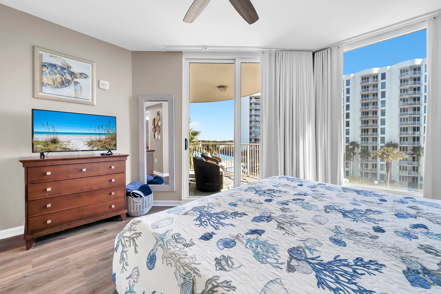 Your coastal bedroom offers the perfect retreat with beach-themed decor and stunning views.