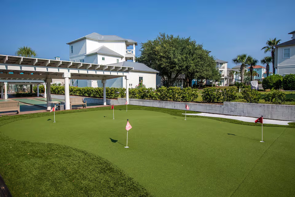 Practice your short game on the community putting green in a relaxed outdoor setting. Perfect for friendly competition or sharpening your skills during your stay. A fun amenity for enjoying sunny afternoons and laid-back vacation vibes.
