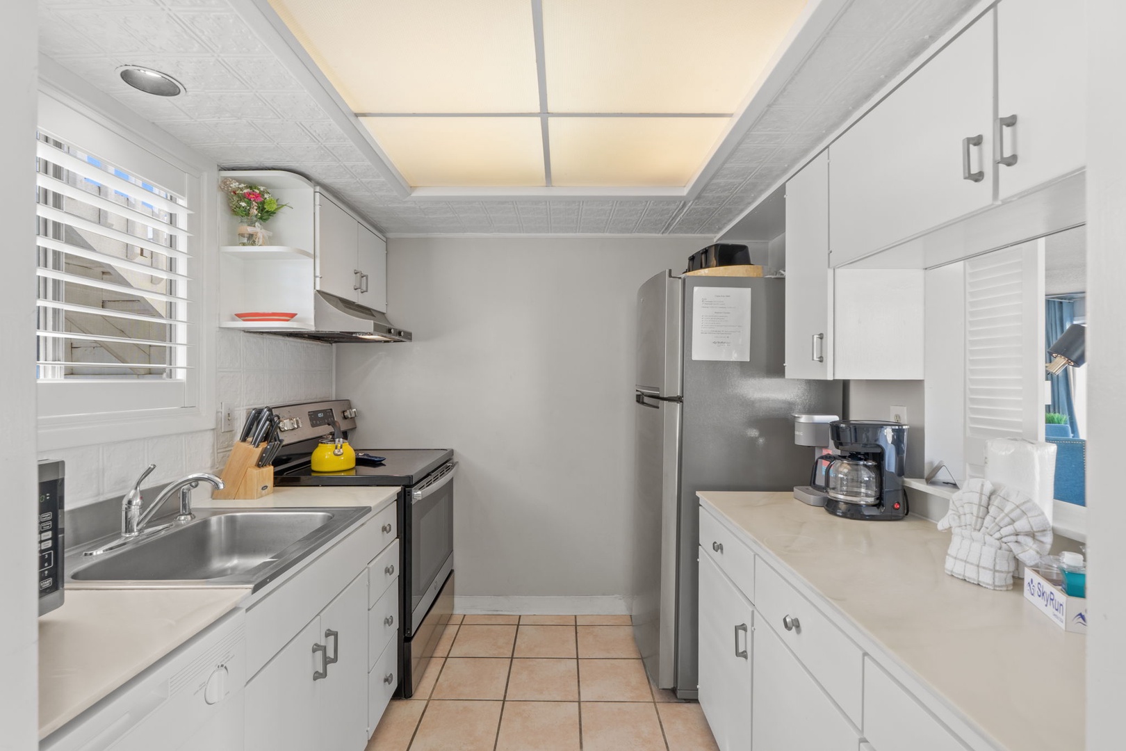 Your fully equipped galley kitchen features modern appliances, ample counter space, and everything you need to prepare meals during your stay.