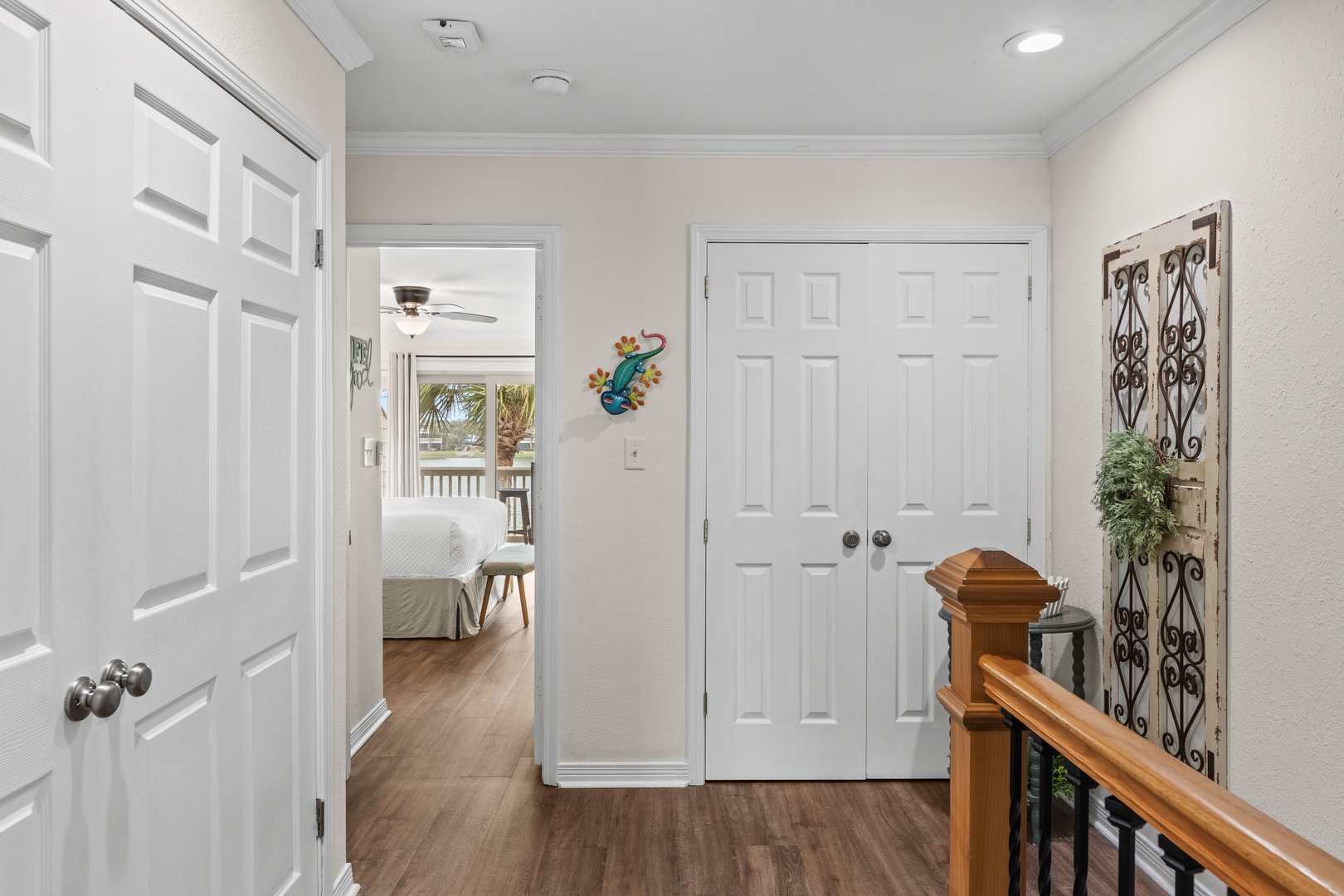 Step into your welcoming hallway with gleaming hardwood floors and bright, airy spaces leading to comfortable bedrooms.