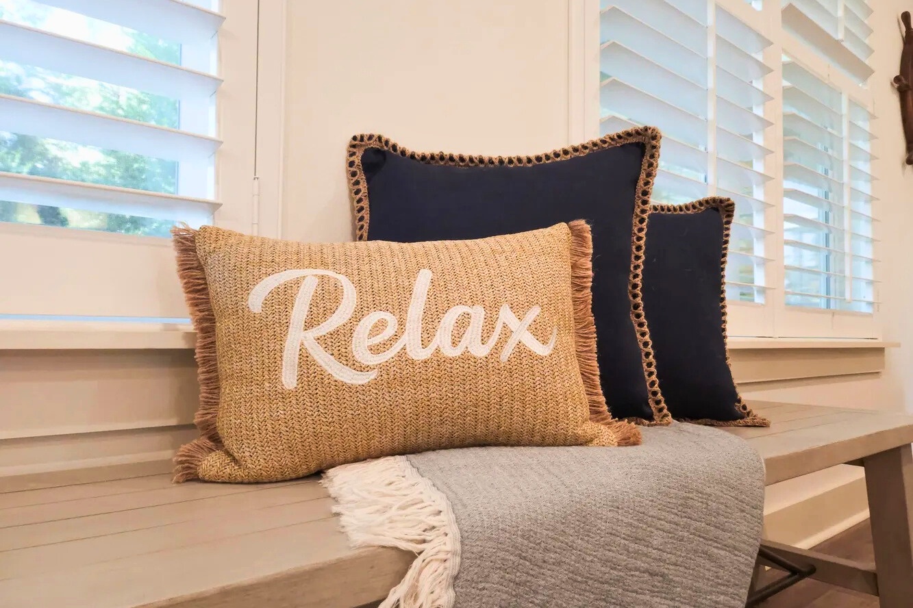 Soft coastal accents and inviting textures create a calm, comfortable space designed for unwinding and embracing the laid-back Florida lifestyle.