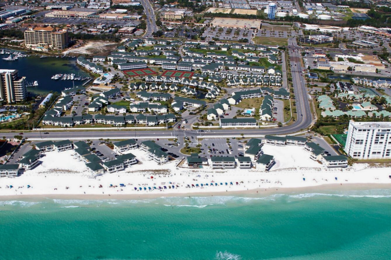 Stunning beachfront location with pristine white sand beach and emerald Gulf waters at your doorstep.