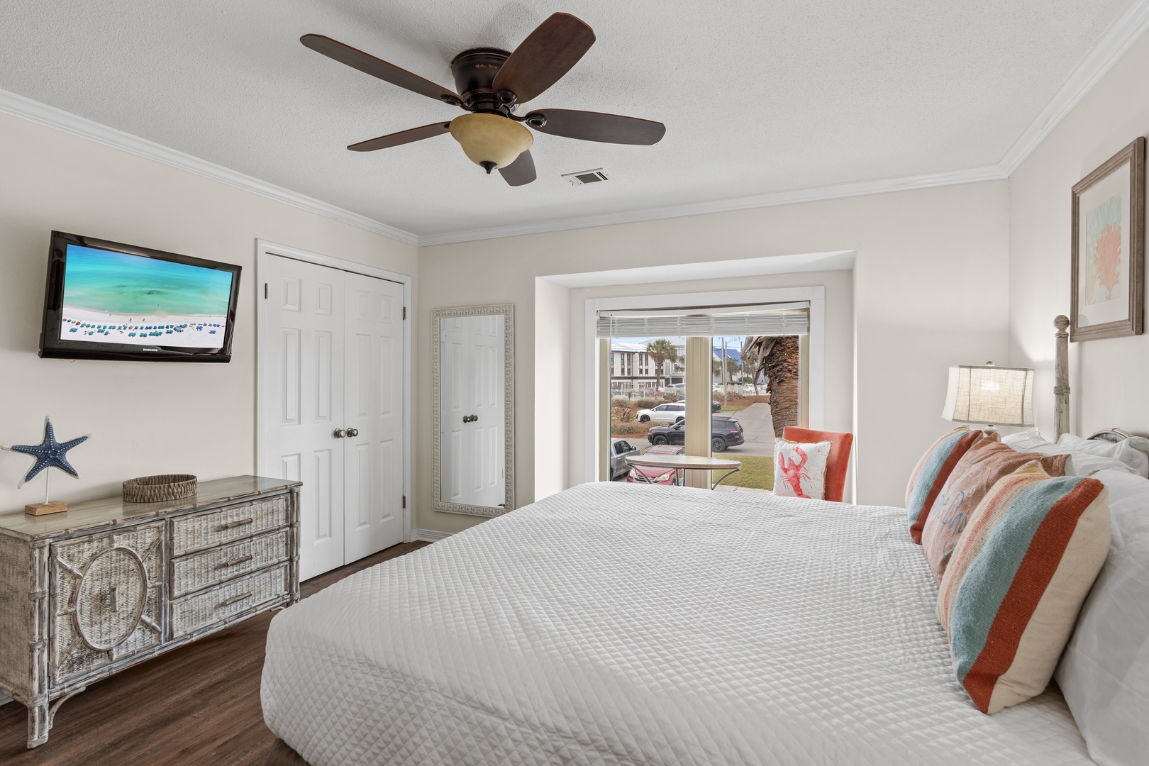 Wake up refreshed in your cozy bedroom with a ceiling fan to keep you cool and a TV for relaxation.