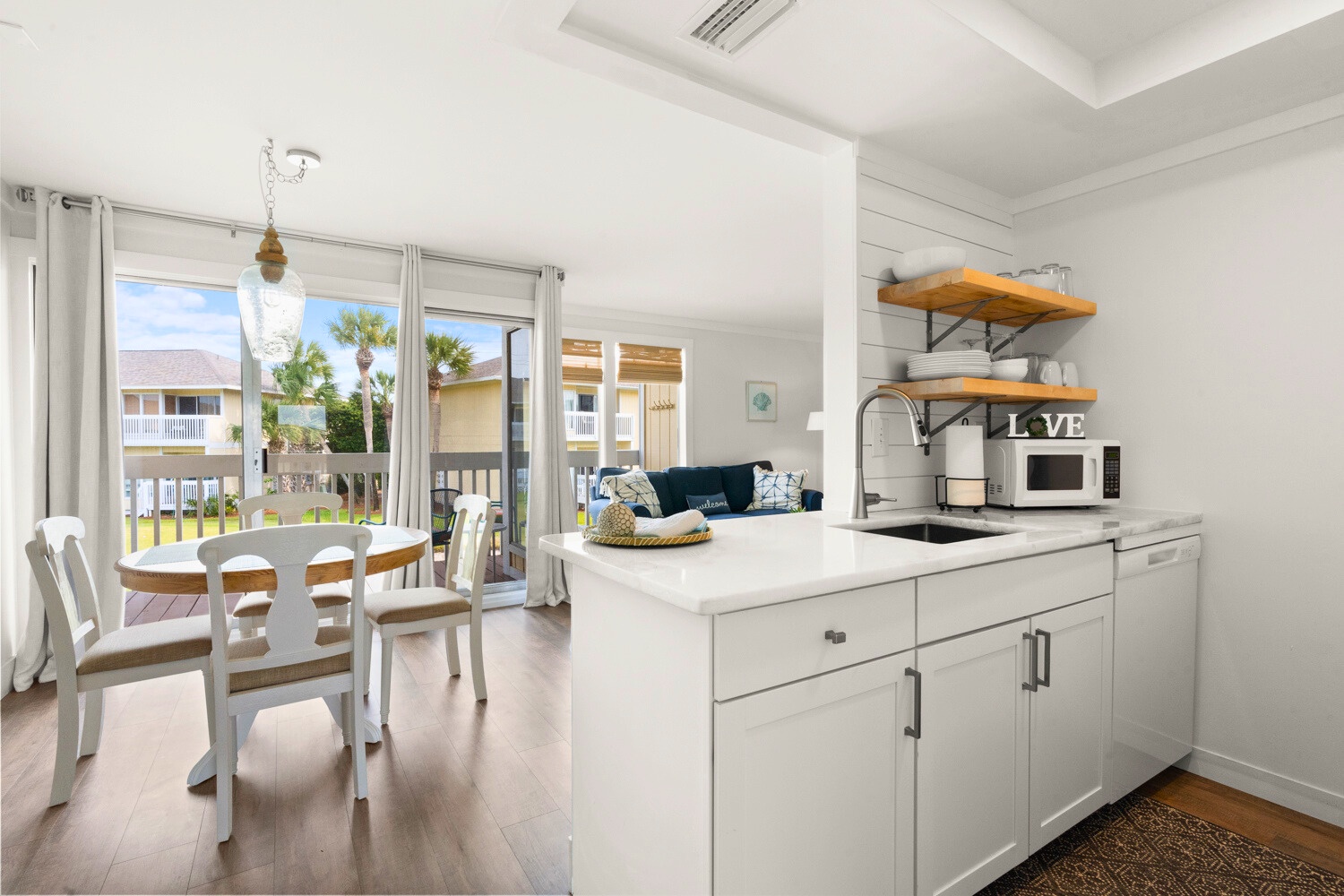 Your bright, open kitchen flows seamlessly into the dining and living areas, creating the perfect space for memorable meals together.