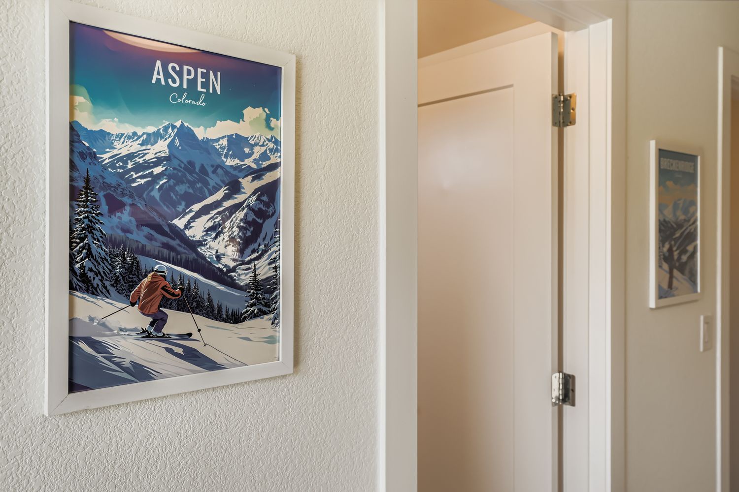 Your hallway welcomes you with charming mountain-inspired artwork, setting the tone for your alpine getaway adventure.