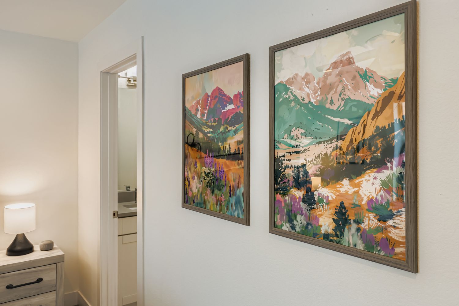 Admire vibrant mountain artwork while relaxing in your thoughtfully curated bedroom, where creative touches inspire peaceful moments.