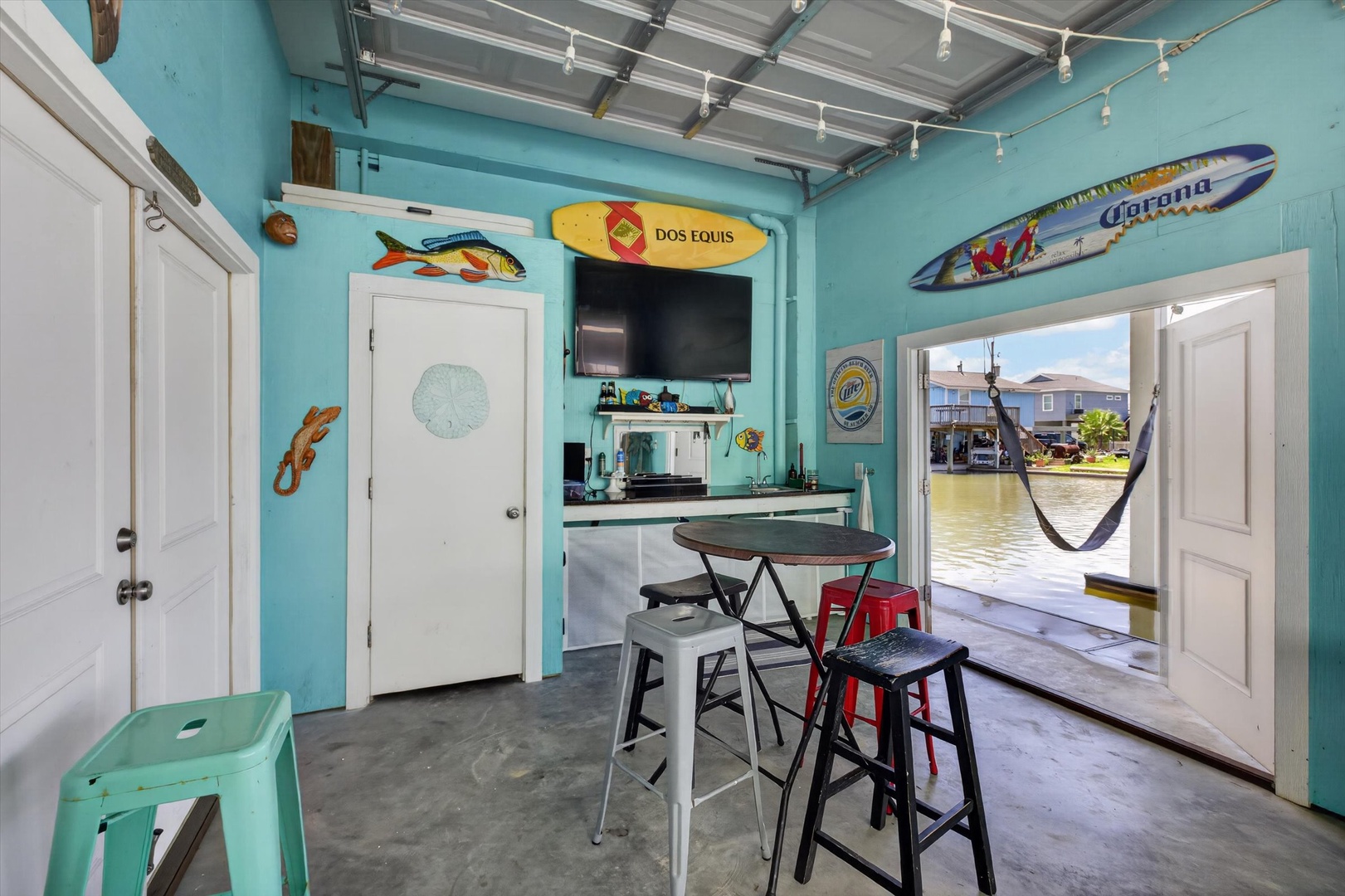 Your private waterfront hangout with surf vibes and canal views.