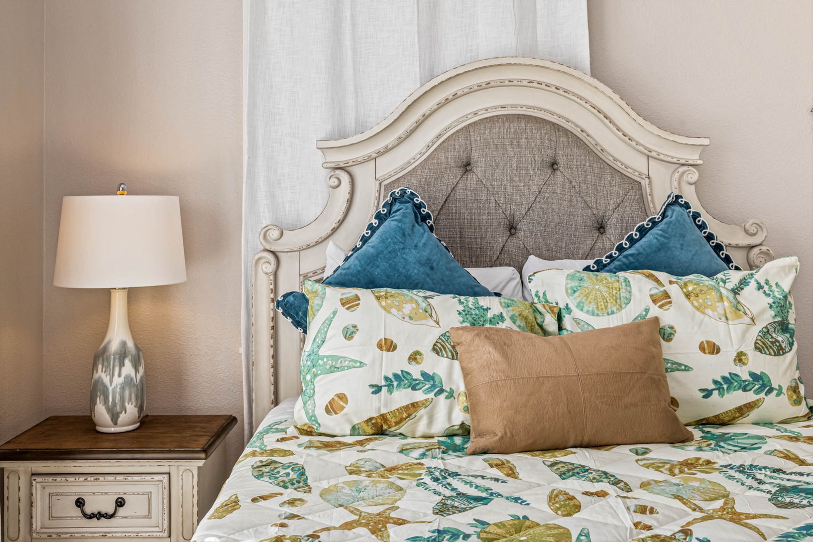 Relax in a coastal retreat with tropical bedding.