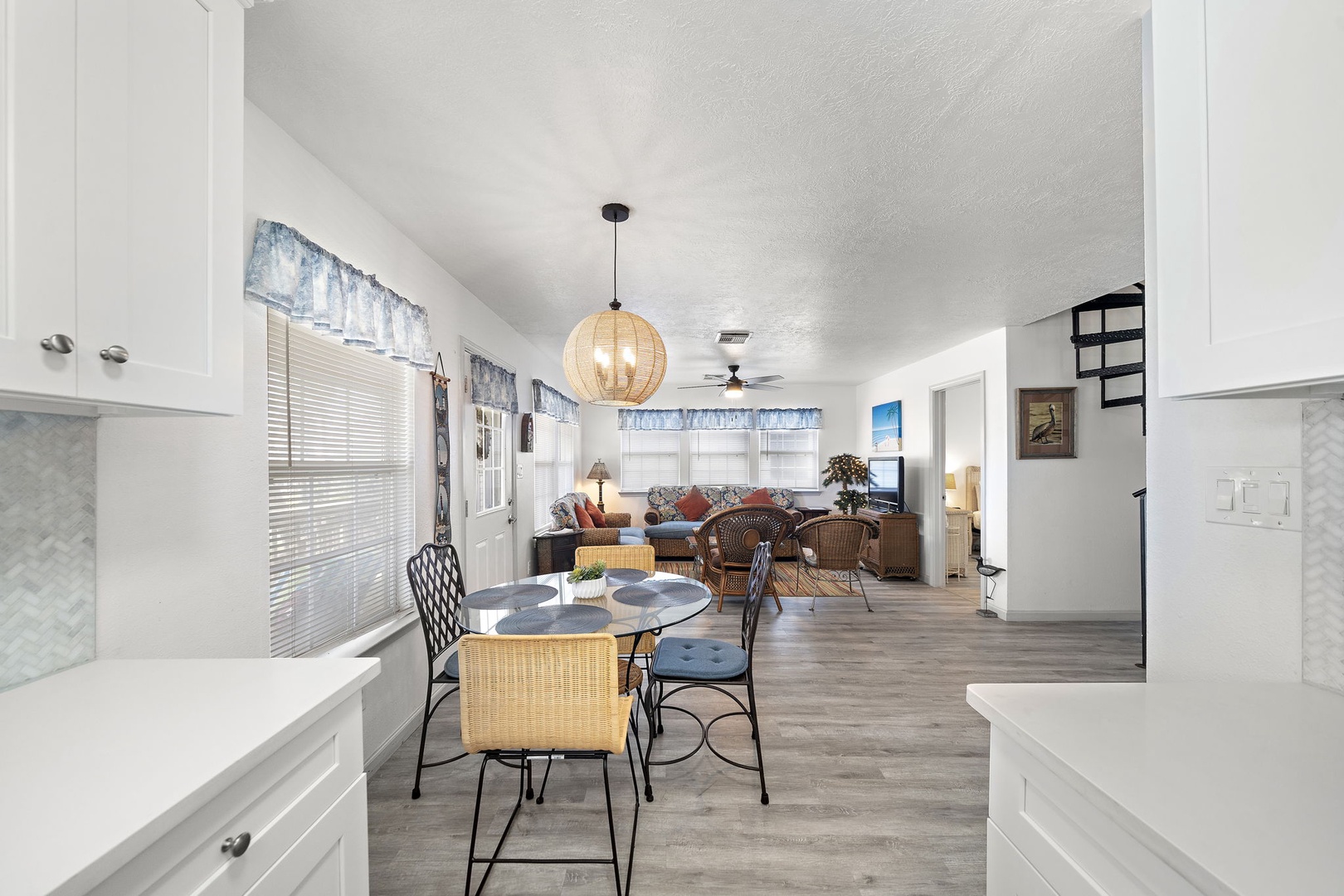 view from the kitchen of the open living area, stay connected to your family while whipping up meals or some cocktails