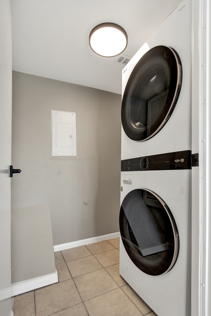 In-unit washer and dryer for easy vacation laundry.