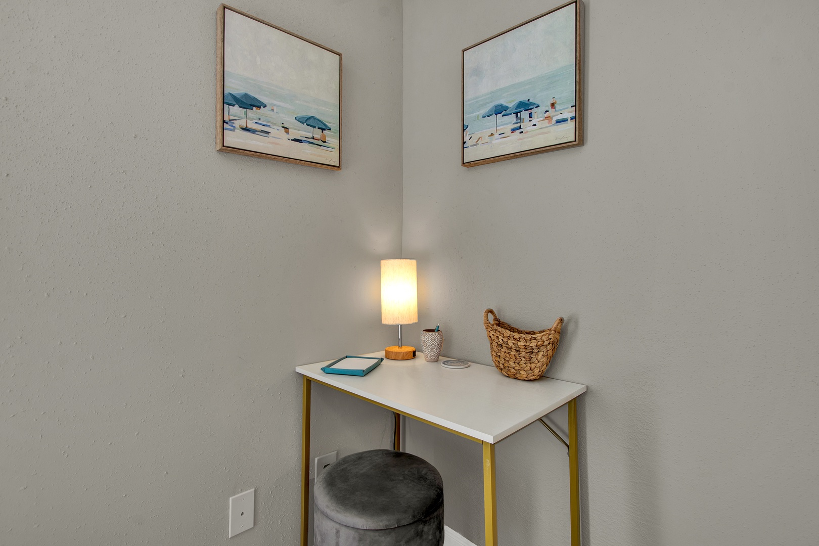 Cozy corner with desk and warm lamplight.