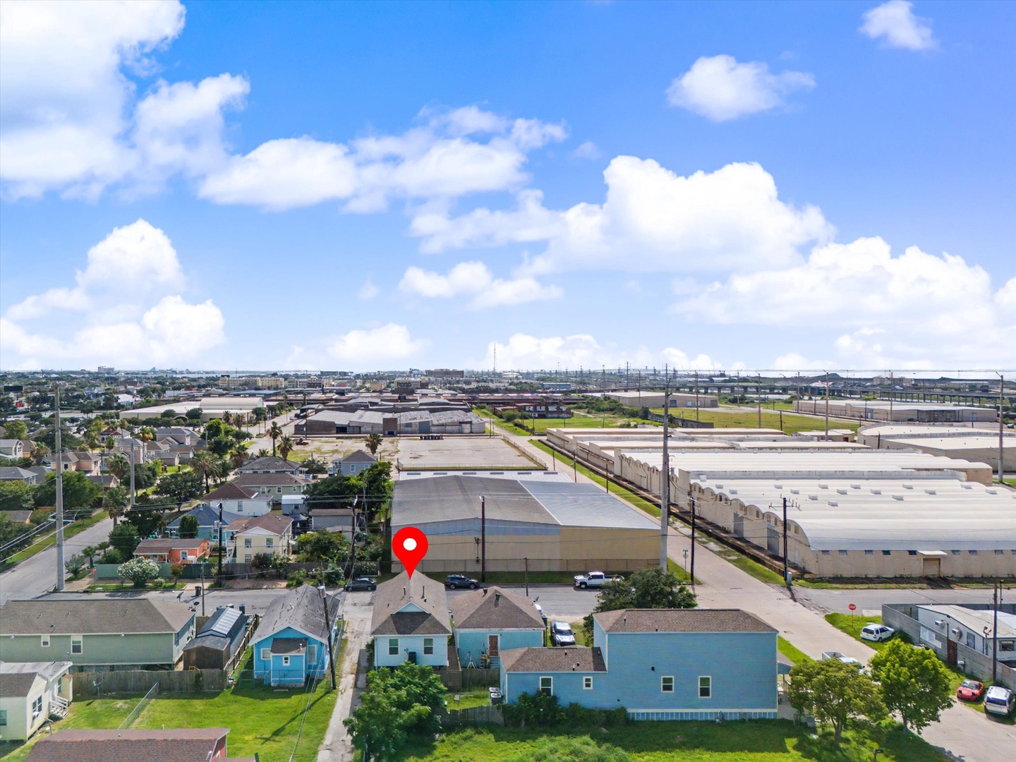 Aerial view of residential neighborhood and nearby amenities.