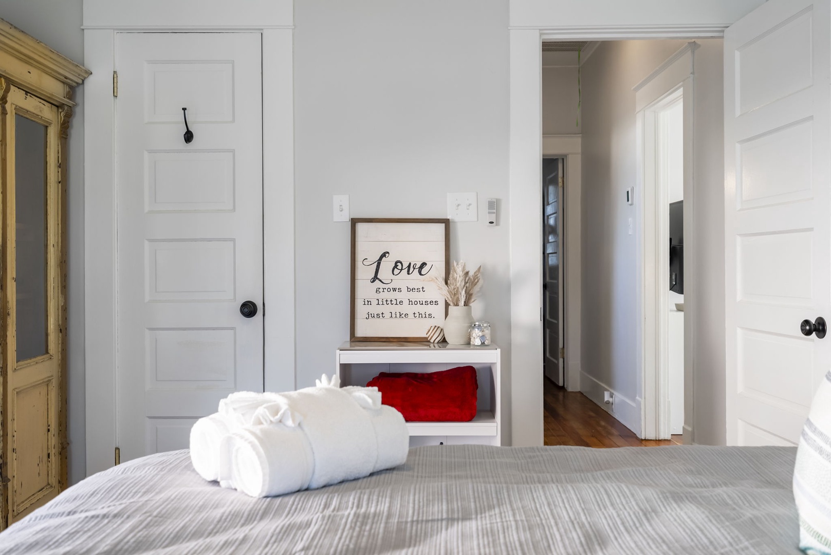 Primary bedroom has all the amenities to make it a cozy refuge.