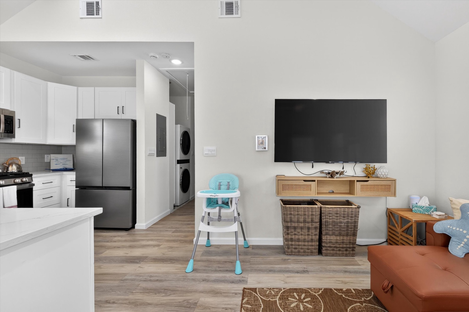 High chair provided, stored in bedroom closet