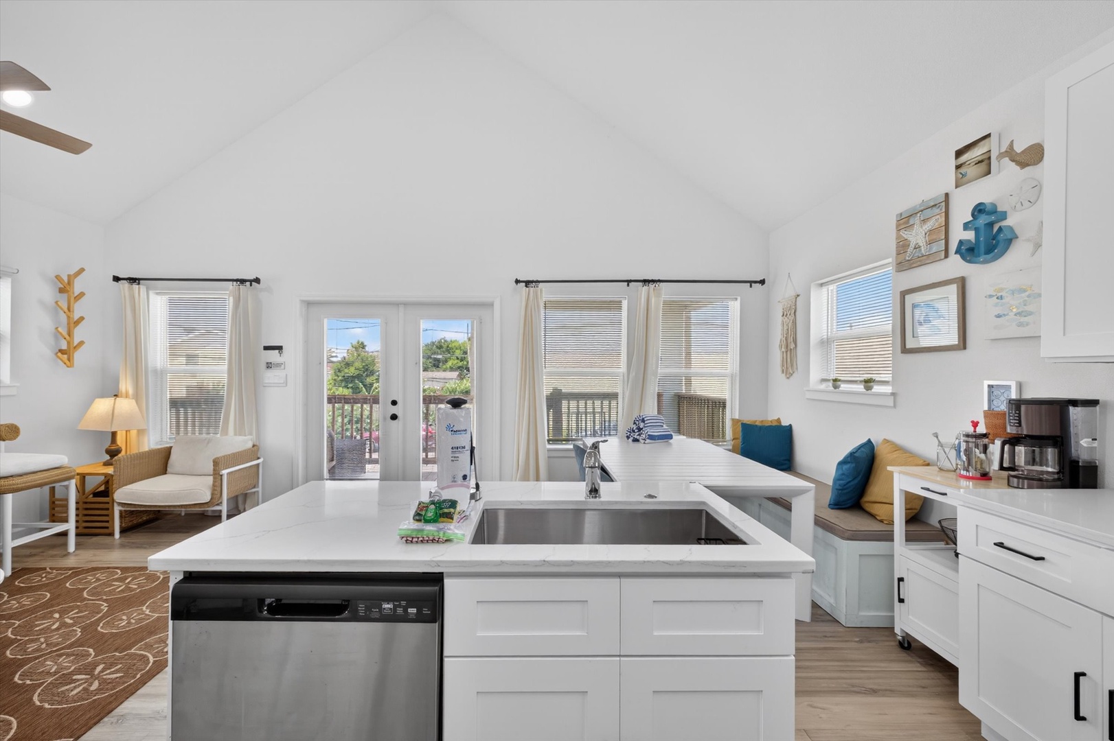 Cozy lounge, dining nook, and private balcony.