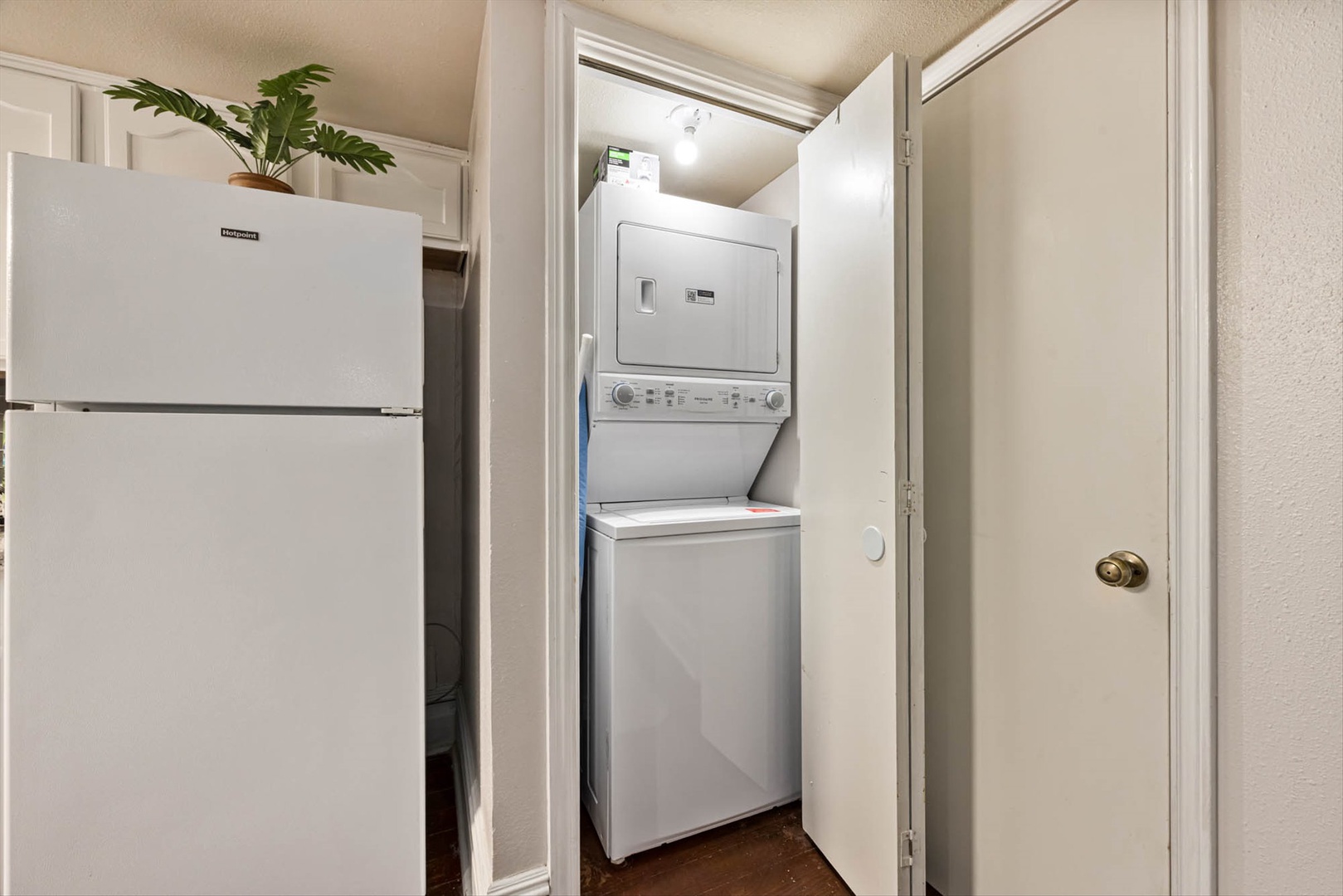 In-unit washer and dryer tucked in a convenient laundry closet.