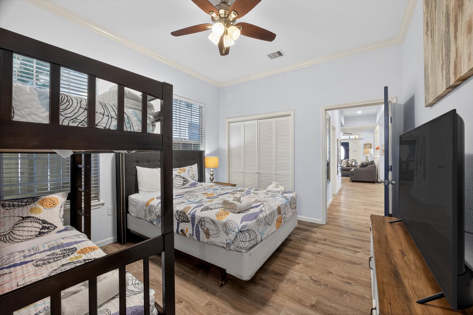 Rest in your spacious bedroom with both bunk beds and a queen bed, plus your own TV for nighttime entertainment.
