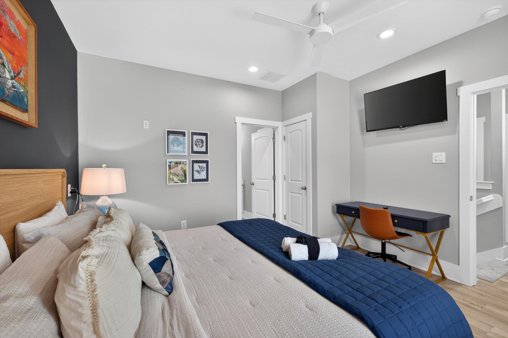 Coastal-inspired bedroom with views and soft linens.