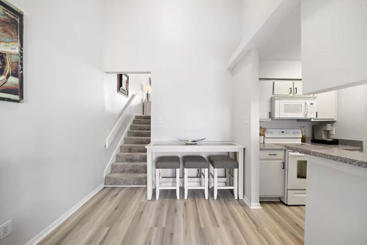 Bright retreat with kitchen, dining & wood floors