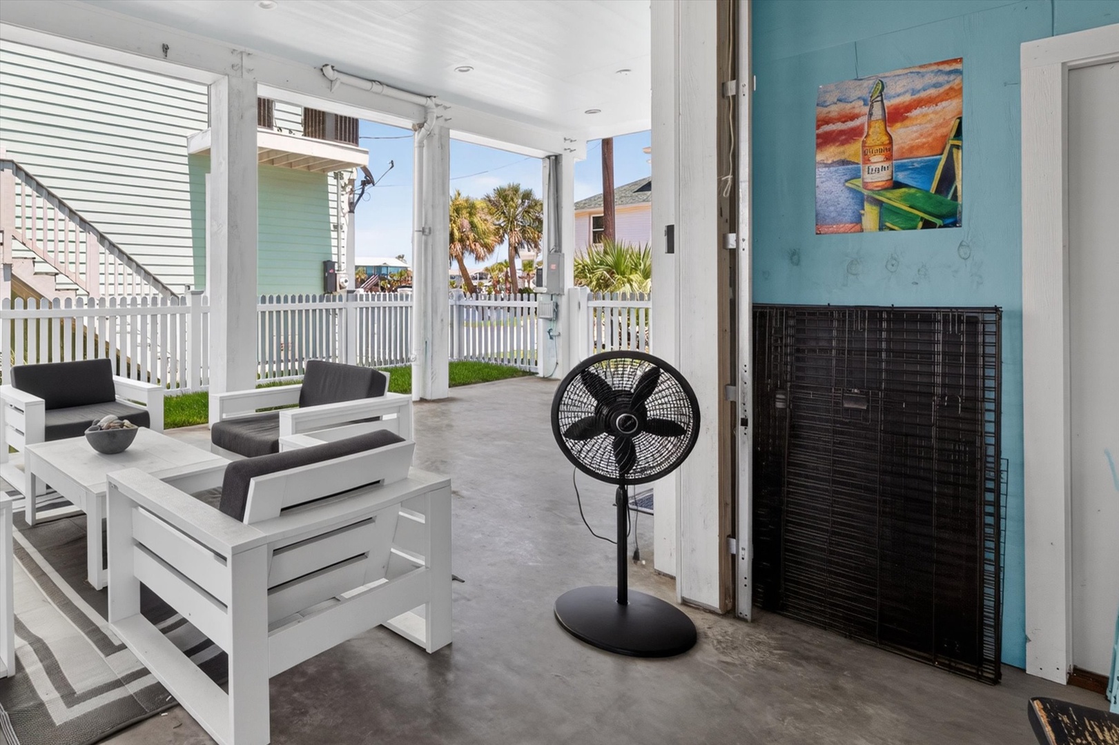 Relax on private porch with breezes, steps from beach