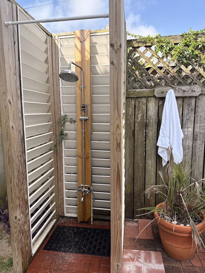 Rinse off under your own private outdoor shower—perfect for cooling down on sunny days or refreshing after a beach trip.