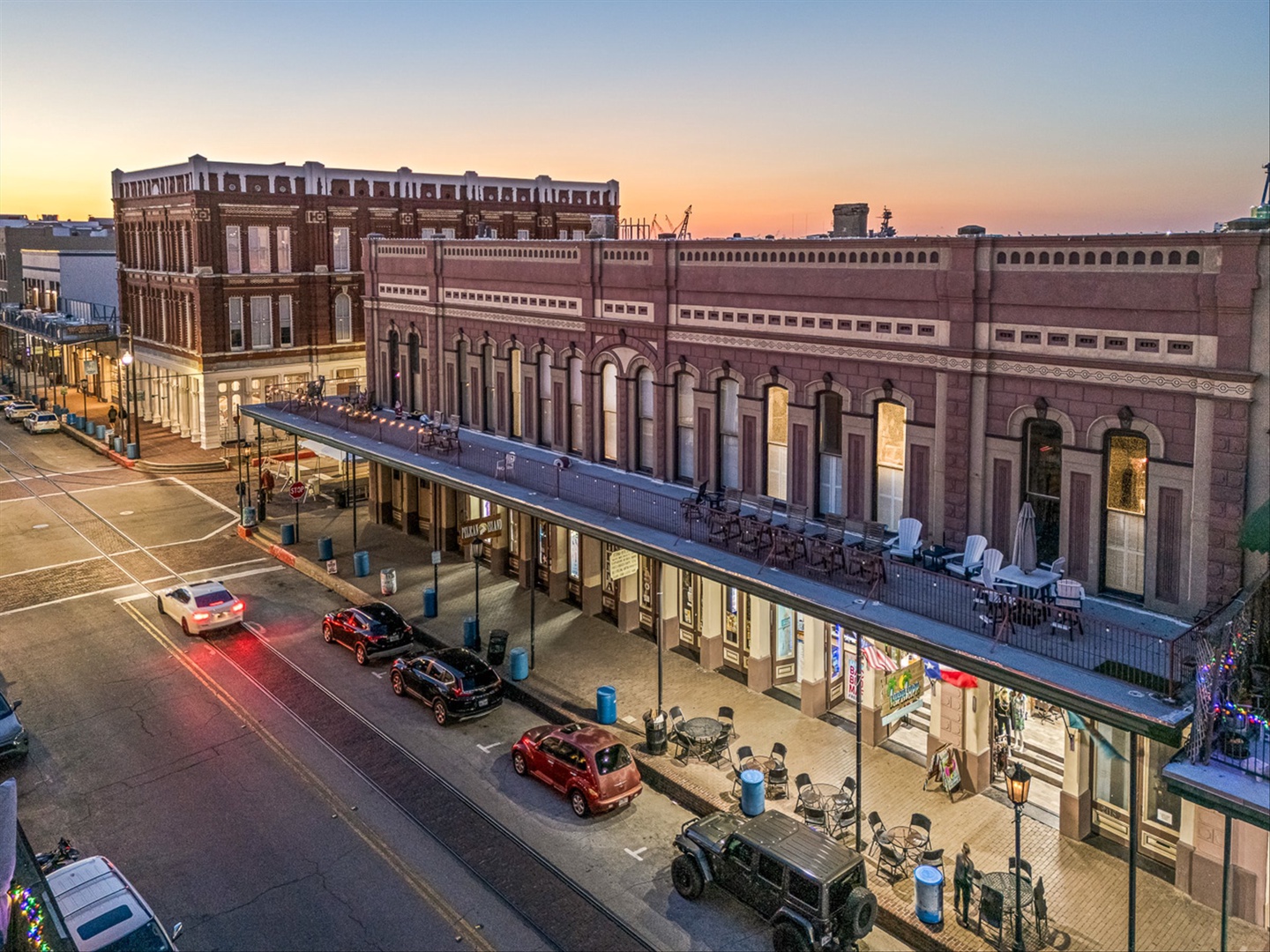 Downtown sunset with preserved architecture and shops.