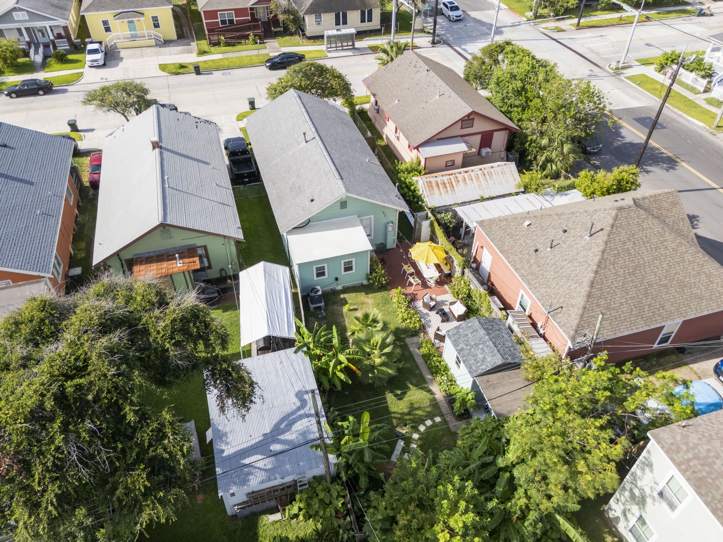 Neighborhood aerial view near beach in central location.